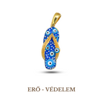 A blue and gold-colored pendant with a geometric pattern, resembling an evil eye, on a chain. 925 sterling silver, 14K gold plated.